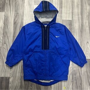 Kids Nike blue windbreaker jacket with hood and zipper pockets